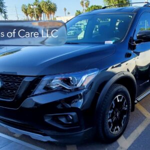 A nissan pathfinder rock creed car.