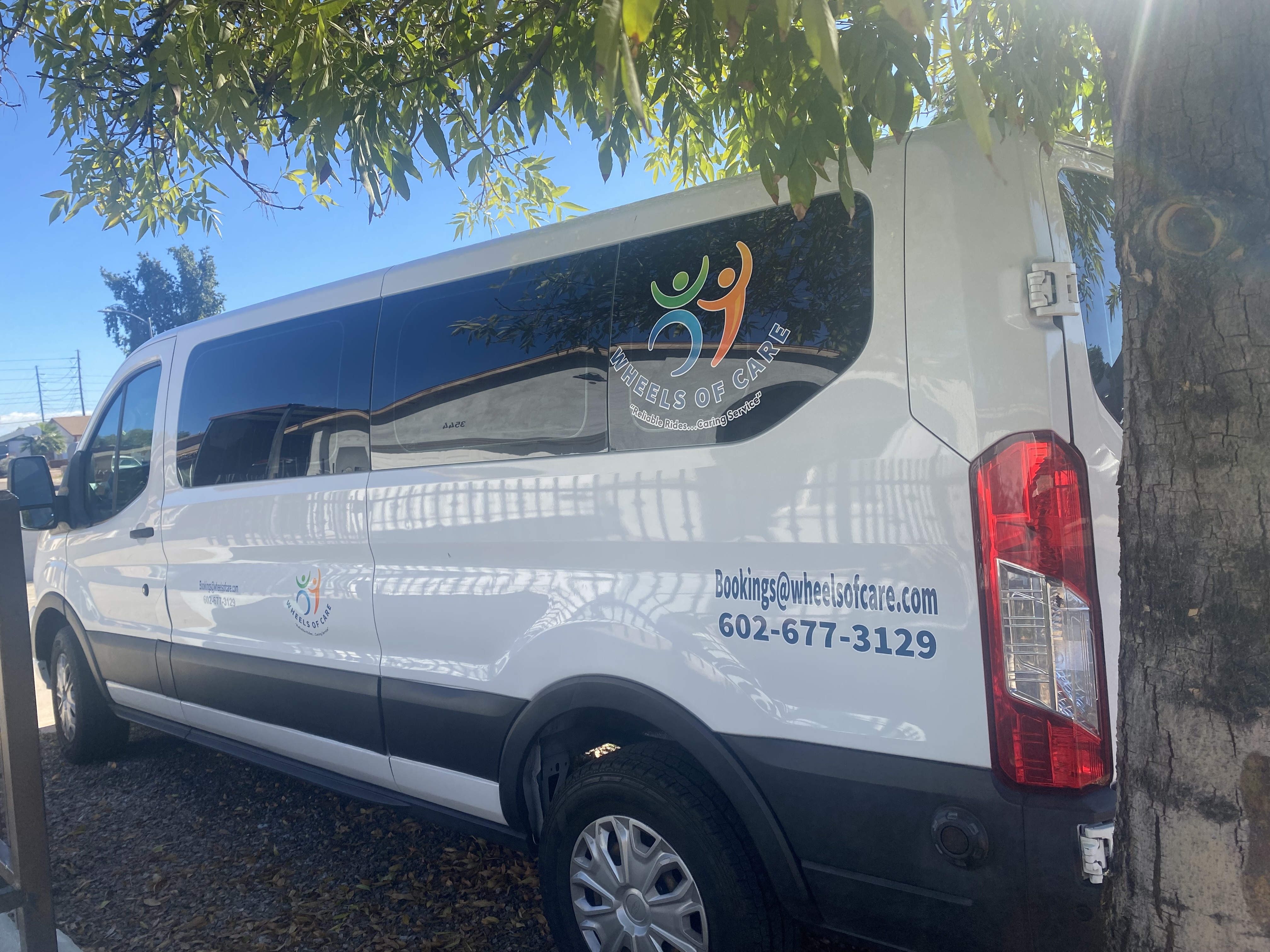 13 Passenger White Van